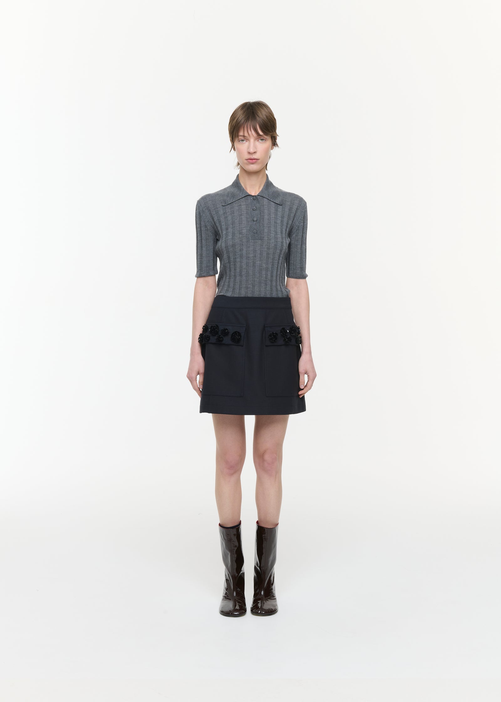 MINI SKIRT WITH EMBROIDERED POCKETS
