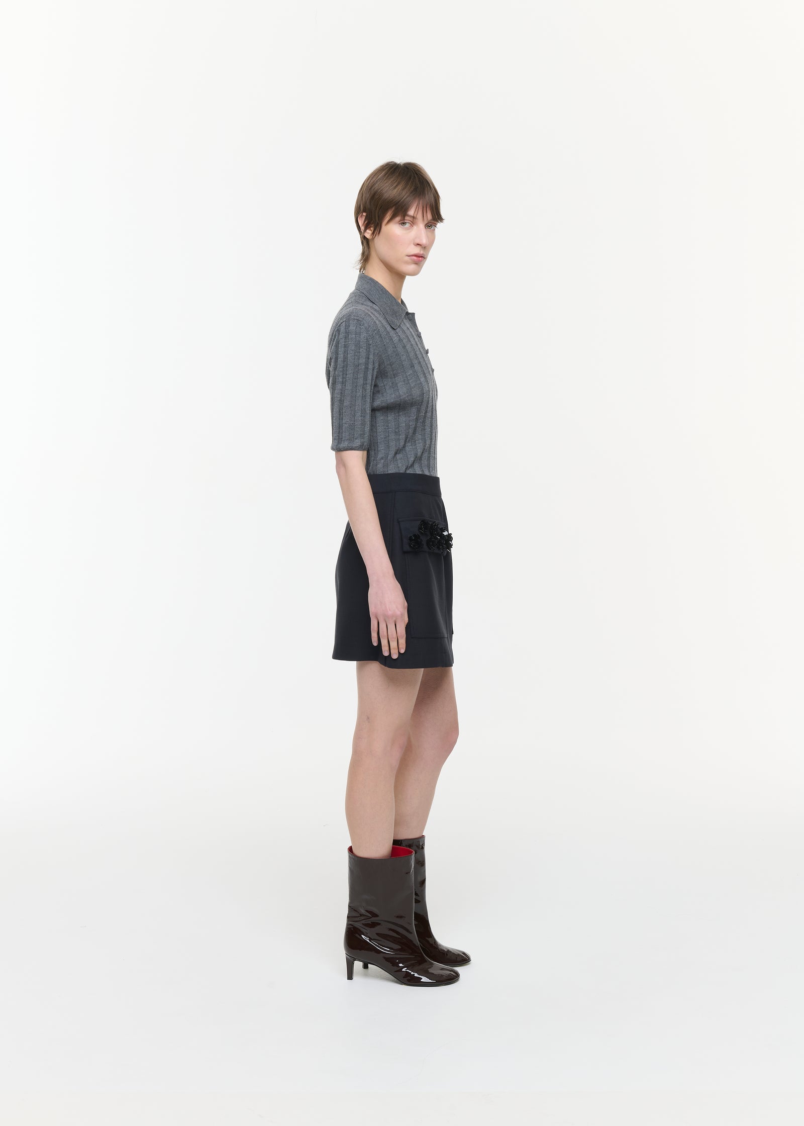 MINI SKIRT WITH EMBROIDERED POCKETS