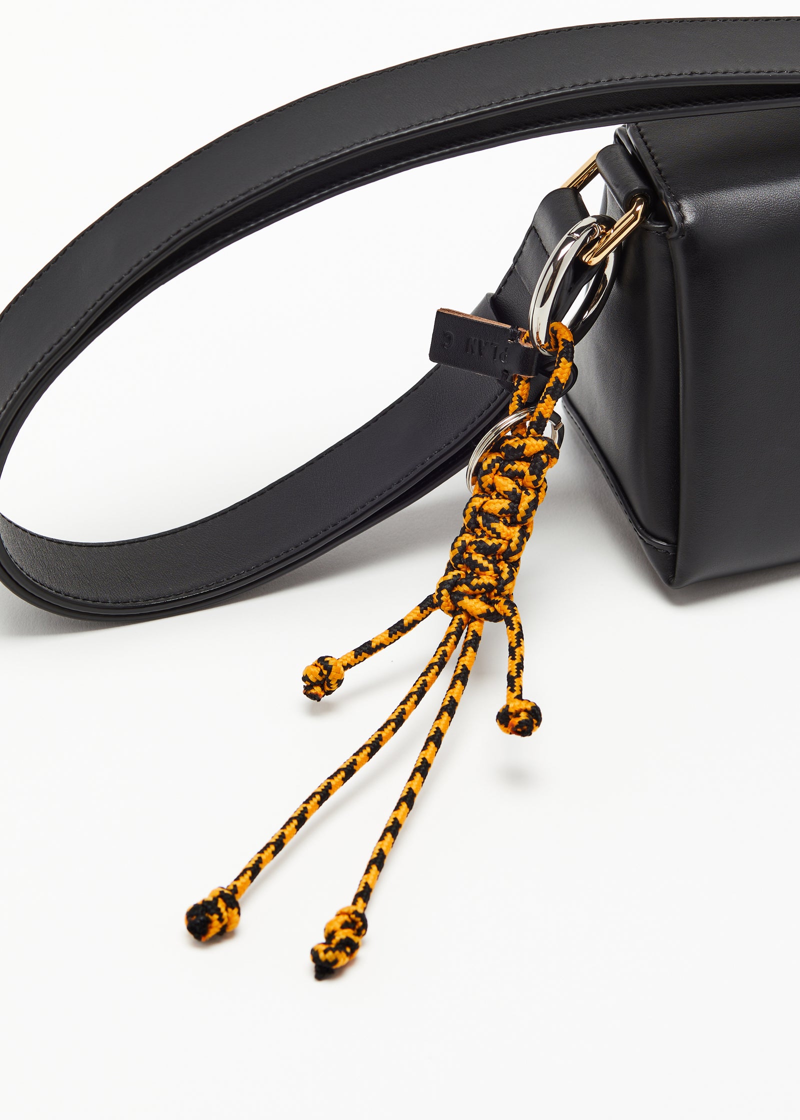 ORANGE AND BLACK KEY RING WITH HAND WOVEN LANYARD FRINGES