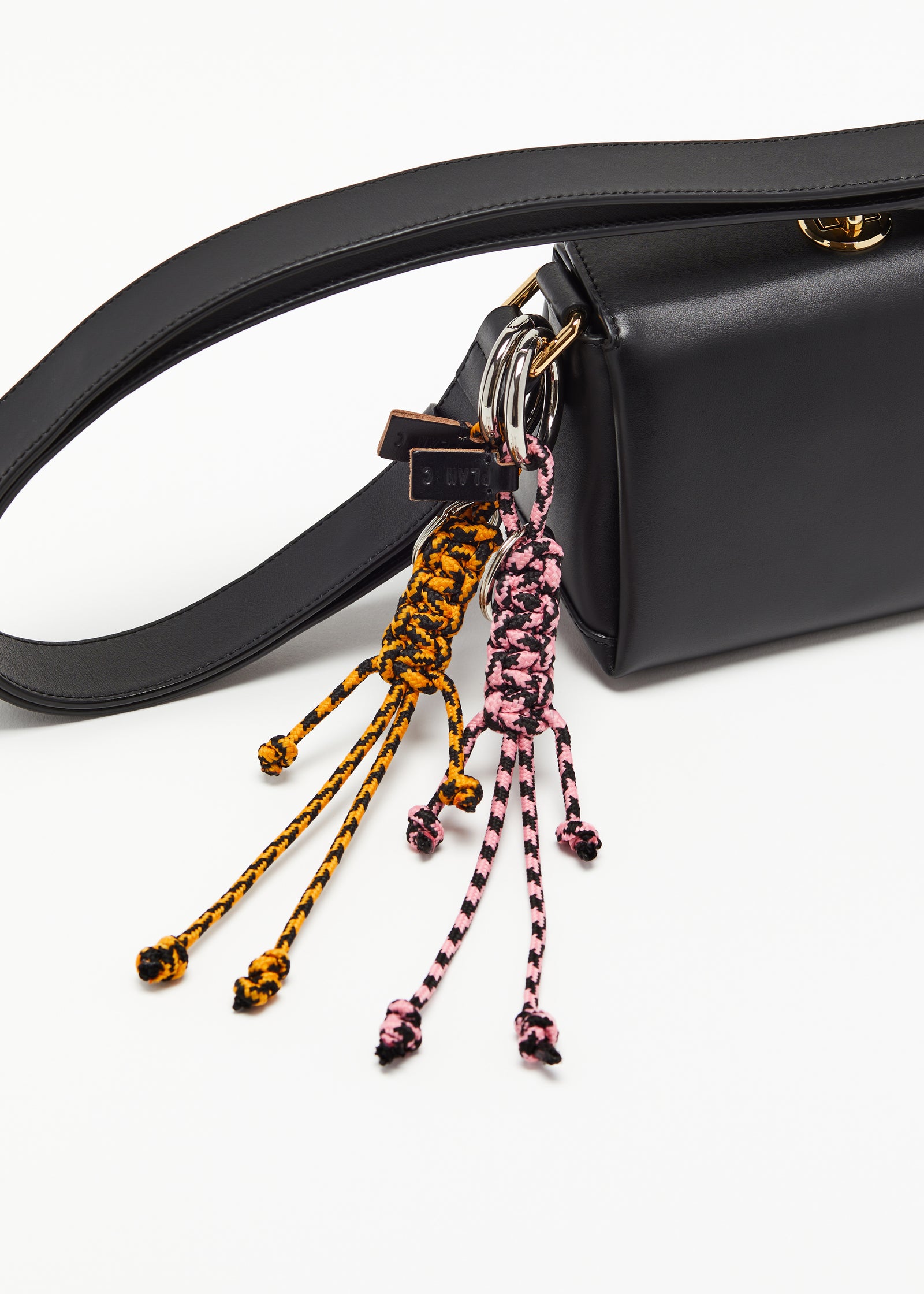 ORANGE AND BLACK KEY RING WITH HAND WOVEN LANYARD FRINGES