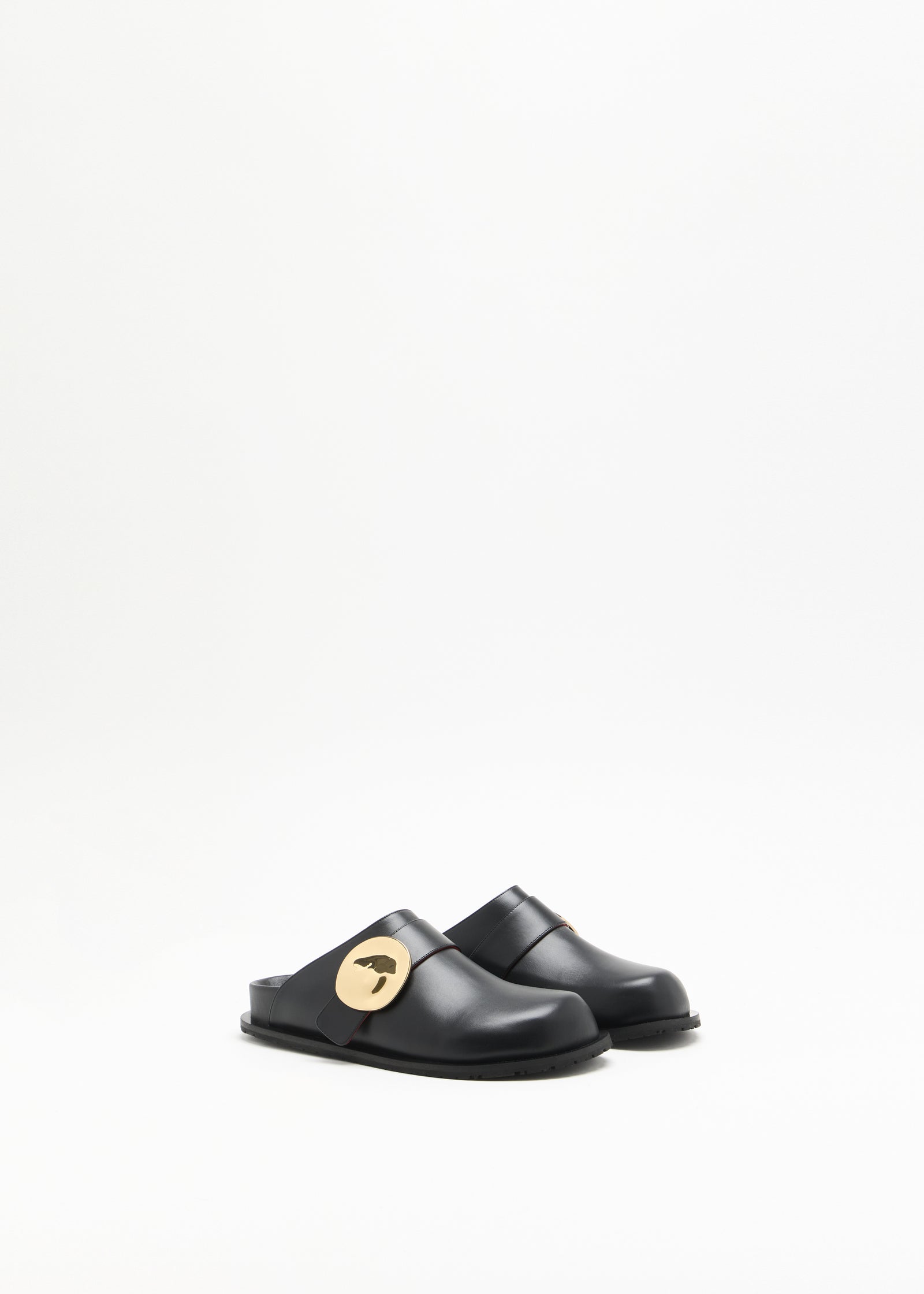 BLACK CALFSKIN CLOGS WITH METAL CIRCLE