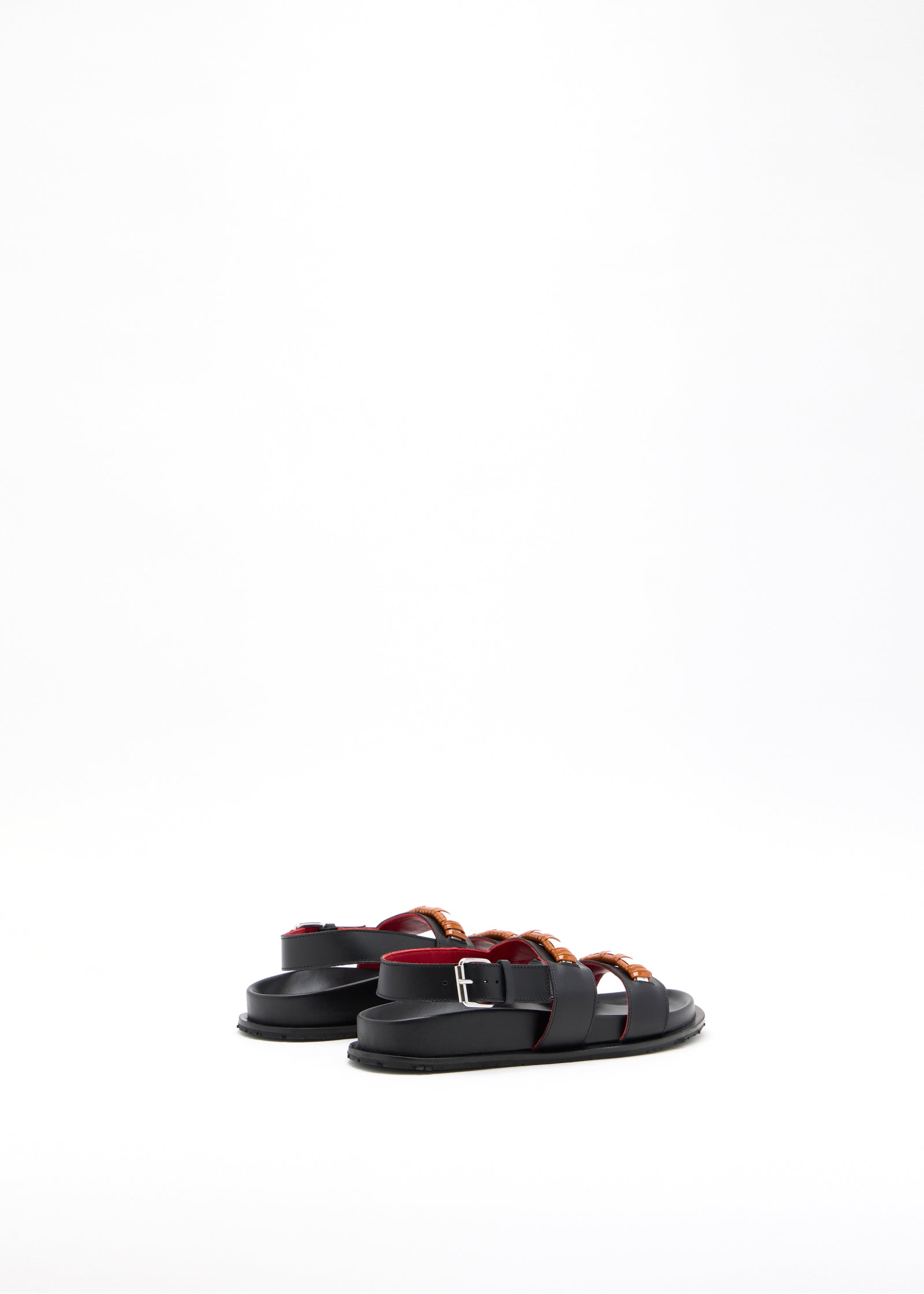 BLACK FUSSBETT WITH DECORATED STRAP