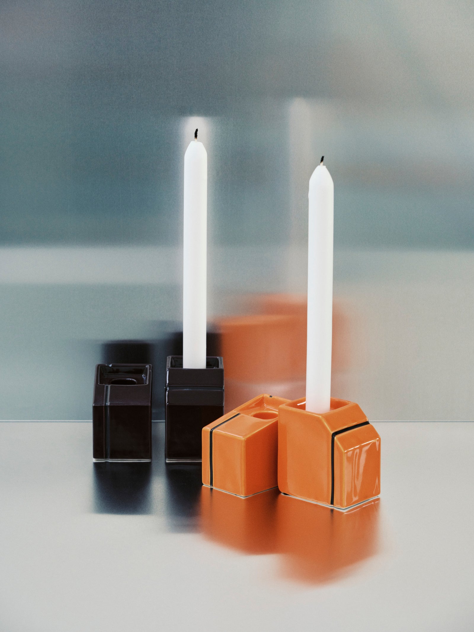 ORANGE CANDLEHOLDERS
